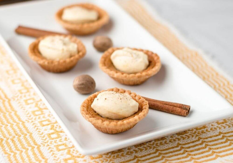 mini pumpkin pies on baking tray