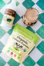 Organic Collagen Peptides pouch on green tiles beside a Cocoa Mint Syrup bottle and a glass of chocolate drink