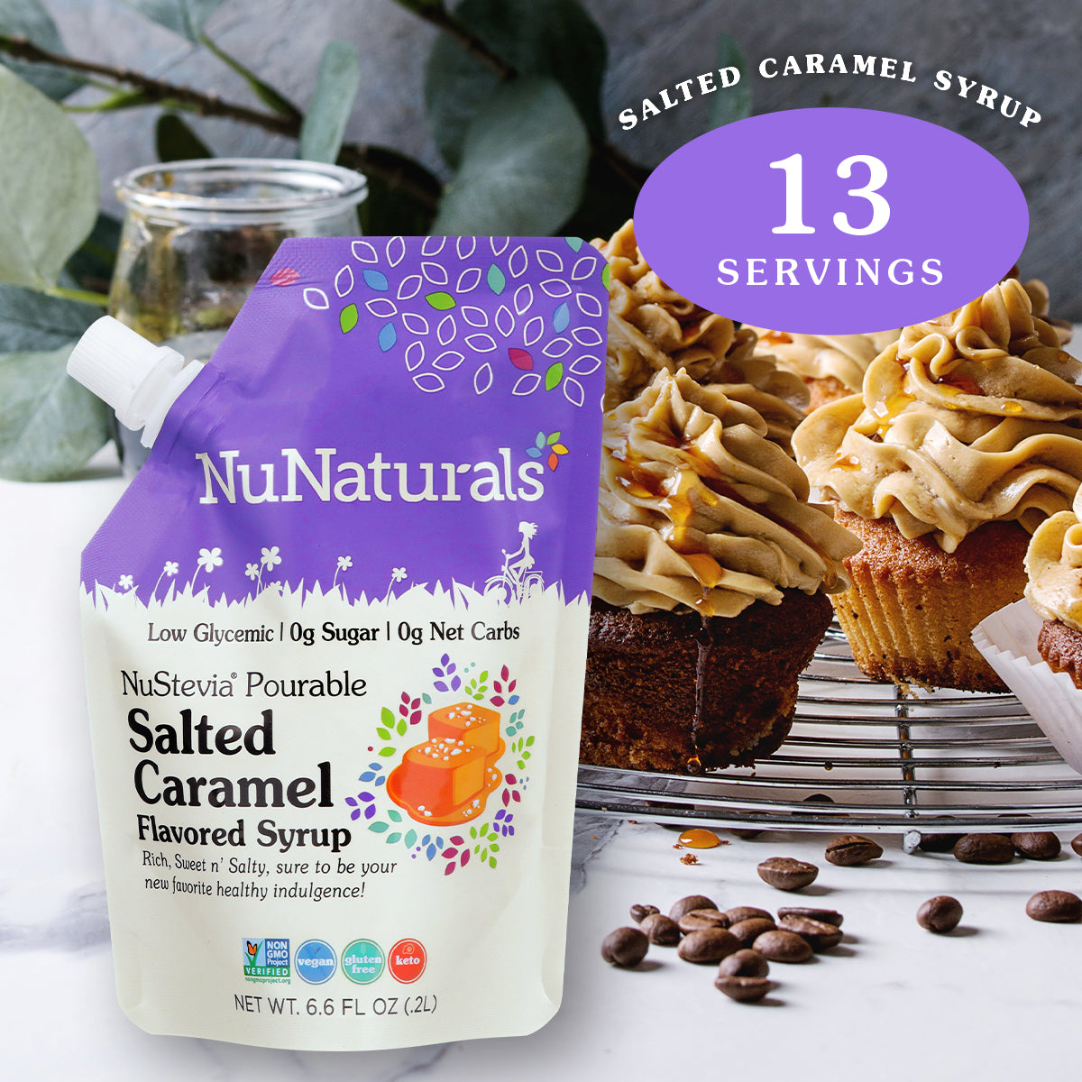 6.6 oz. NuNaturals Salted Caramel Flavored Stevia Syrup with frosted cupcakes and a syrup drizzle